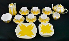 1932 Rare Shelley Tea/Coffee Set in Yellow "Star Flower" or "Harlequin" Pattern.