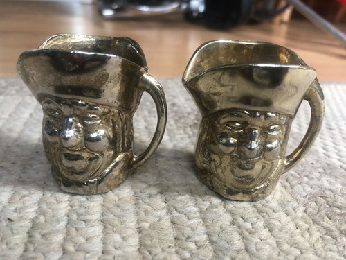 Vintage brass toby - x,