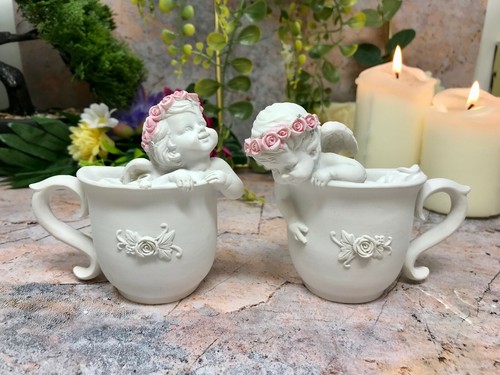 Pair adorable cherub - of,