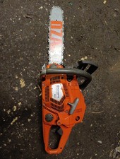 2014 Husqvarna 555 chainsaw with new 15 inch bar and chain good condition