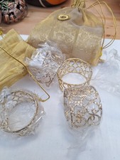 2 Gold bags with 8 napkin