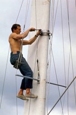 Eric Tabarly repairs the mast of his trimaran Pen Duick IV in 1968 Old Photo