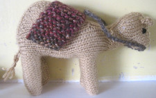 A FABULOUS HAND KNITTED NATIVITY CAMEL FOR CHRISTMAS DISPLAY.