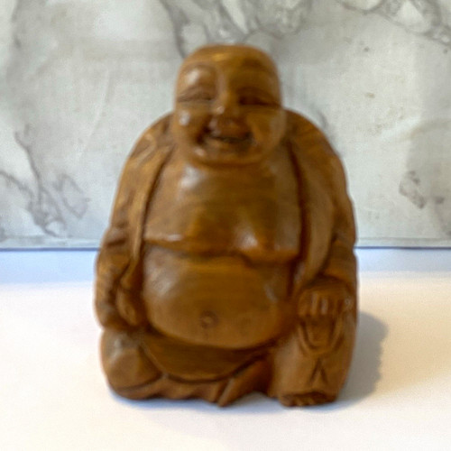 Vintage hand carved laughing