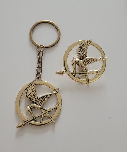 Hunger games mockingjay gold - games,
