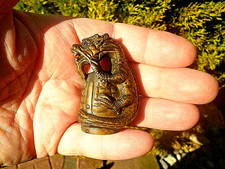 Hand Carved wood netsuke of a