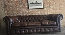 A Brown Vintage Three Seater Chesterfield  Sofa
