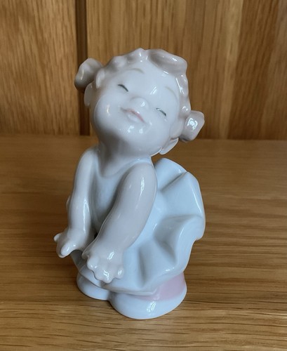 Nao lladro figurine - by,