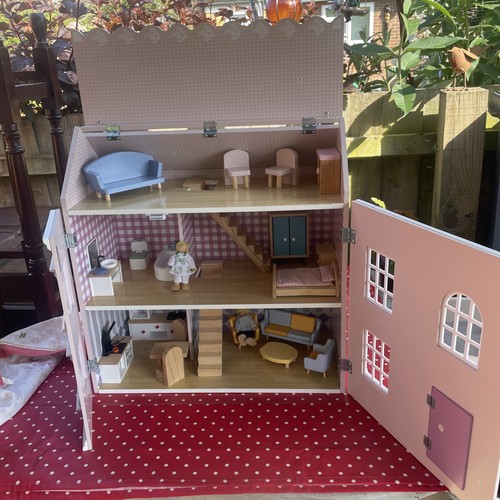 Wooden dolls house with all - house,