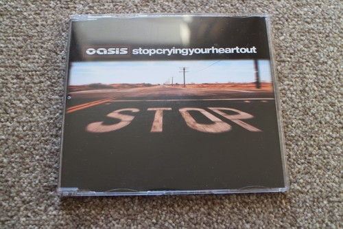 Oasis stop crying your - -,