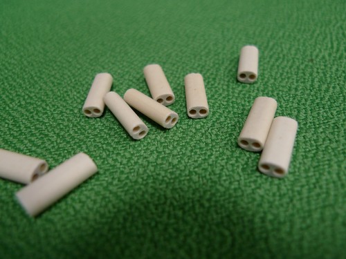 Ceramic insulator twin - ceramic, bore