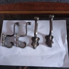  4 Antique Cast Iron Coat