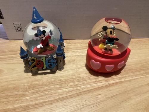 Disney snow globes pre - 2, owned