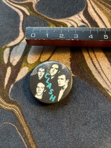 The clash pin - clash, button
