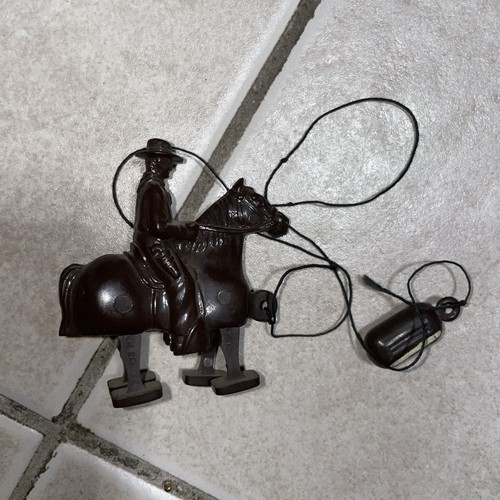 Vintage black plastic cowboy - black,