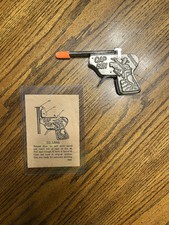 VINTAGE OM "AUTOMATIC" PRESSED TIN EMBOSSED CAP GUN #186 With Paper