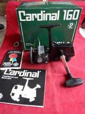 A GOOD USED BOXED ABU CARDINAL