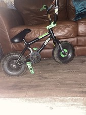 Rocker Mini BMX bike Used Seat Is About Ripped cash only text if any problems 