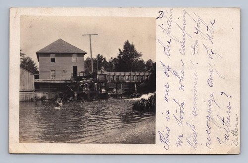 Boys jumping water mill - water,