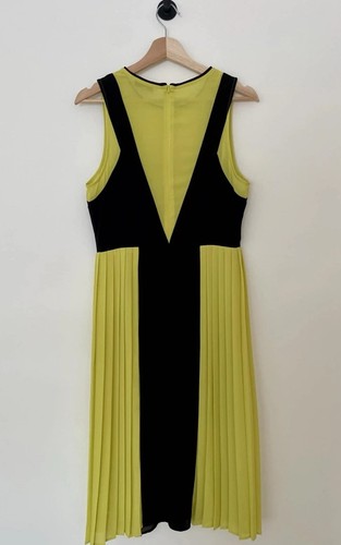 Next yellow black colour block - next,