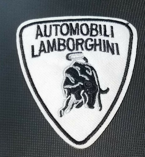 White and black automobili - and,