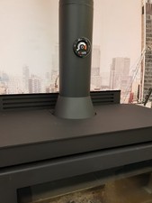 Stove and flue collar.Fire