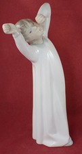 LLADRO BOY AWAKENING YAWNING