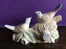 Porcelain birds on nest figure