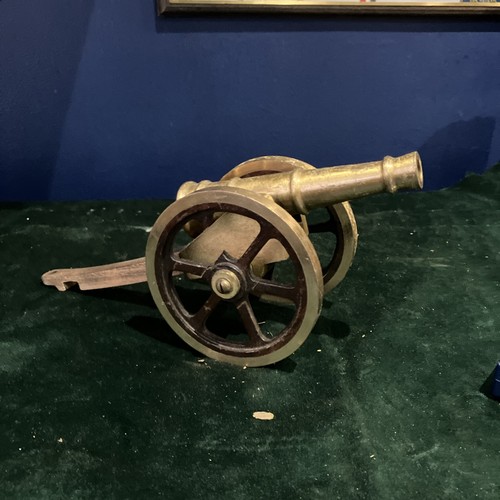 Wood and brass - desk, cannon