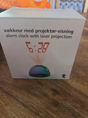 Alarm clock with - with, laser