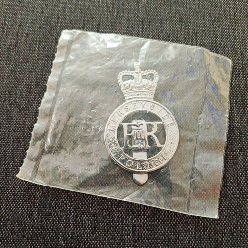 Merseyside police cap badge - police,