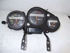 SUZUKI GSXR400 GK76A   CLOCKS + BRACKET   (17,859 km)