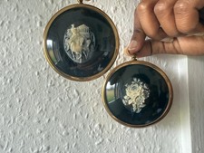 Carved cameo medallions in brass frames from 'The Miniature World of Peter Bates