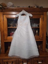 Holy Communion dress age 8 to 10. White, many layers and shin lenght with Belro.