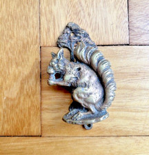 ANTIQUE BRASS SQUIRREL DOOR