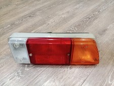 Lancia MONTECARLO Rear Light Drivers Side, RH Side, Chrome Face Surround, New!!