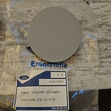 Ford Focus Mk1.New Genuine Front Bumper Tow Eye Cover. 1107426