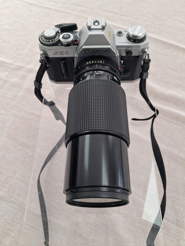 Canon slr camera 70 210mm - ae-1,