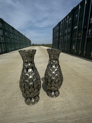Pair silver decorative - of,