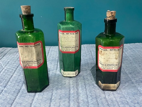 Antique green glass apothecary - green,