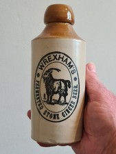 PICTORIAL WREXHAMS GINGER BEER BOTTLE IN MINT CELLAR FOUND CONDITION.