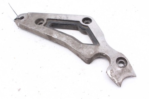 Footrest retaining plate rear