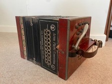 A TANZBAR AUTOMATIC CONCERTINA