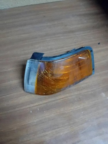 Mazda 323 front left - f,