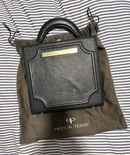 Pied terre handbag - pied,