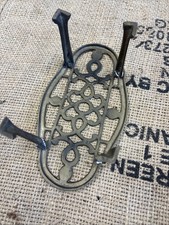 vintage oval brass trivet with