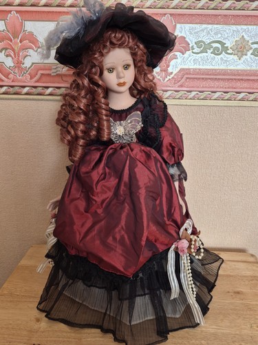 Vintage porcelain doll in - 16",