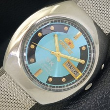 VINTAGE ORIENT SK AUTOMATIC JAPAN 46941 MENS SKY BLUE COLOR DIAL WATCH a703309-2