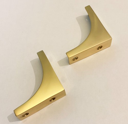Pair solid polished - a, of