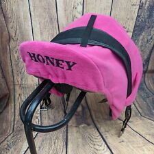 Embroidered Storage Saddle Covers With Girth Loops.
